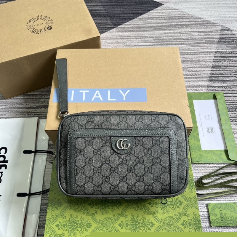 G*u*i clutch bags